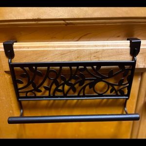 Vine over the cabinet towel bar